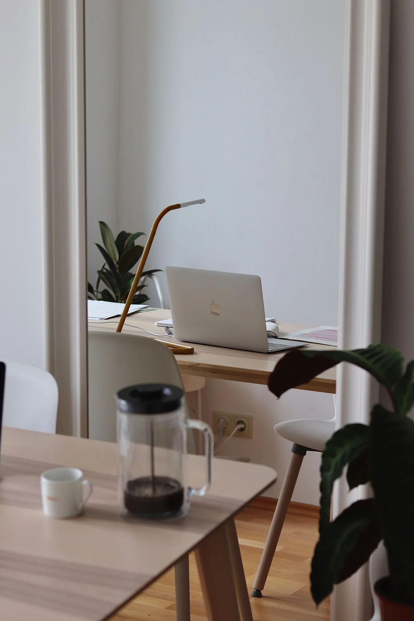 Raised laptop setups — A desk arrangement that gives the screen its own place.