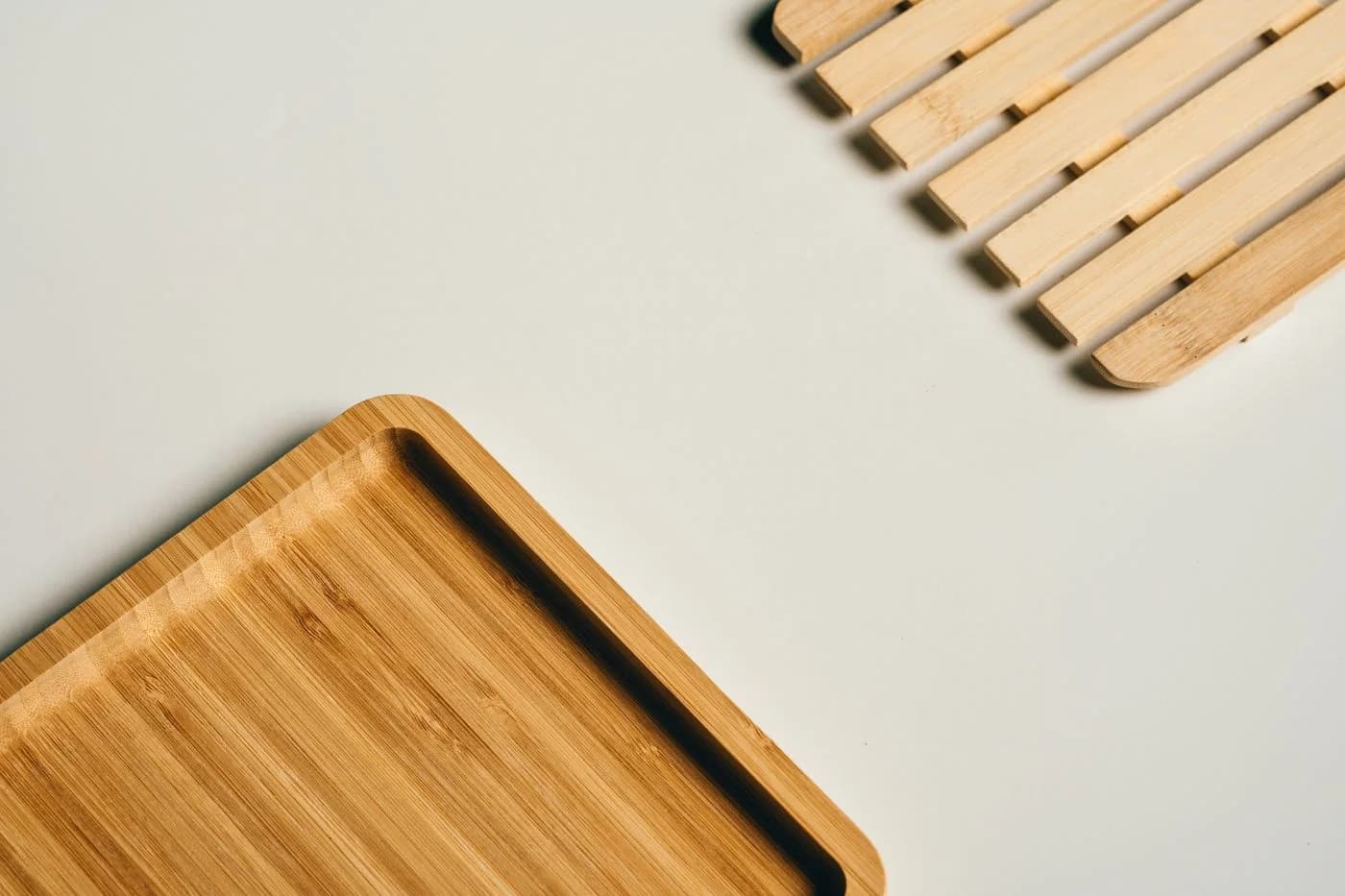 Wooden trays — Simple wooden surfaces for keeping everyday objects together.
